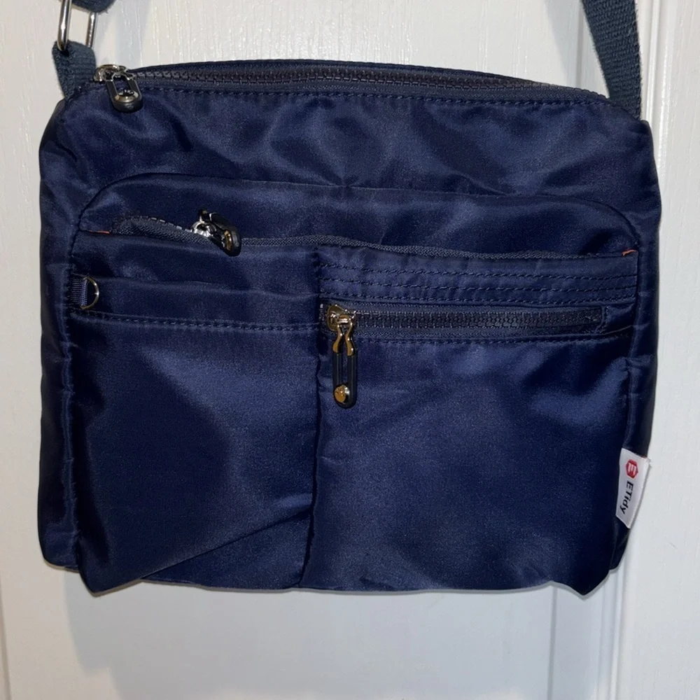 ETIDY BRAND NAVY BLUE NYLON CROSSBODY ADJUSTABLE STRAP ORANGE NYLON INTERIOR